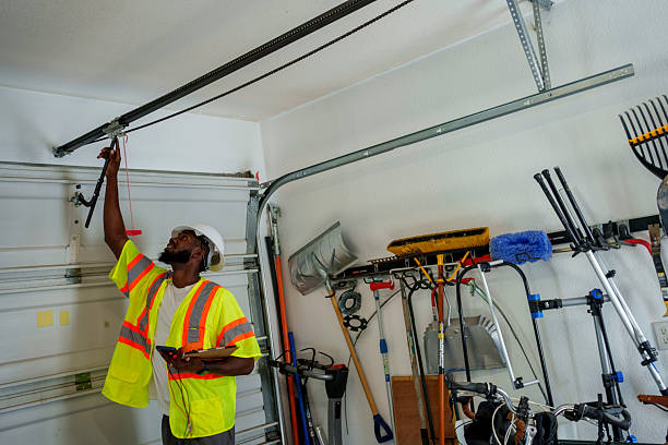 Professional Garage Door Panel Replacement technician working in Burnham, PA
